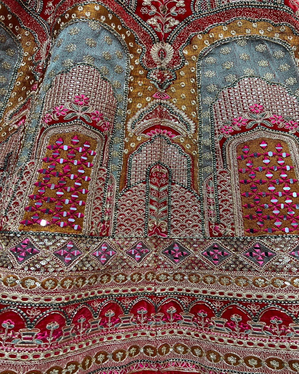 Heavy handwork and hand Mirror crafted designer bridal Lehengacholi