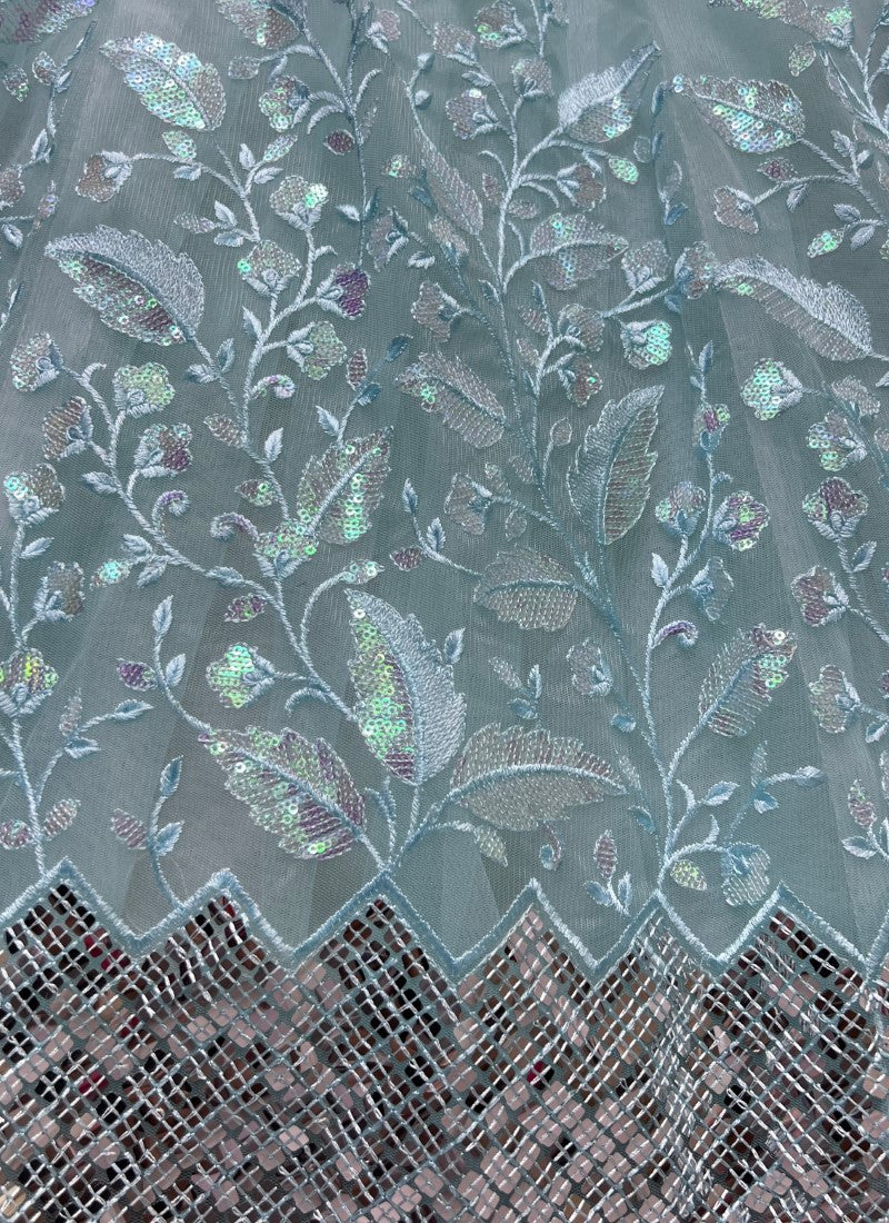 Rainbow Sequins and designer leaf embroidered Sea Blue Lehengacholi with matching purse and Latkan