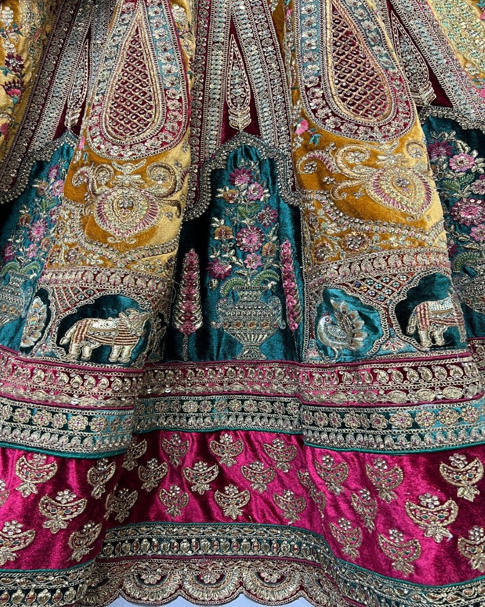 close up image of work on lehengacholi by anjani art