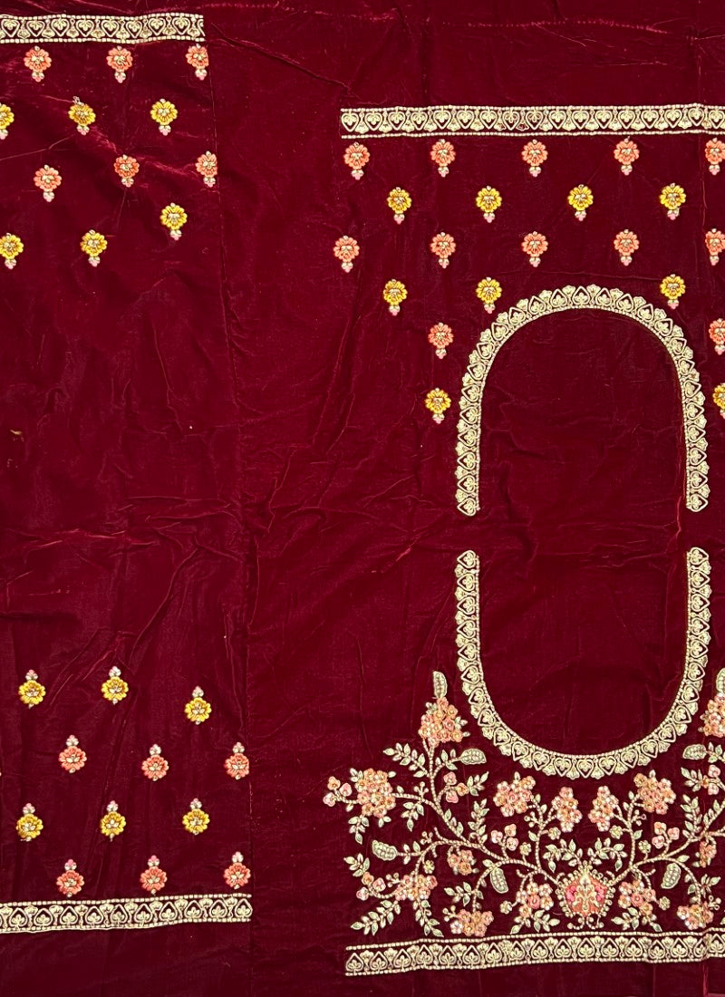 Very well crafted embroidery of peacock and Baarat designed bridal Maroon Lehengacholi