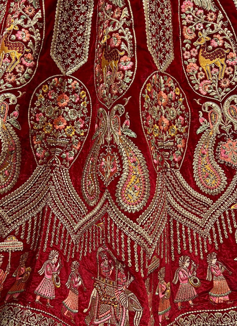 Very well crafted embroidery of peacock and Baarat designed bridal Red Lehengacholi