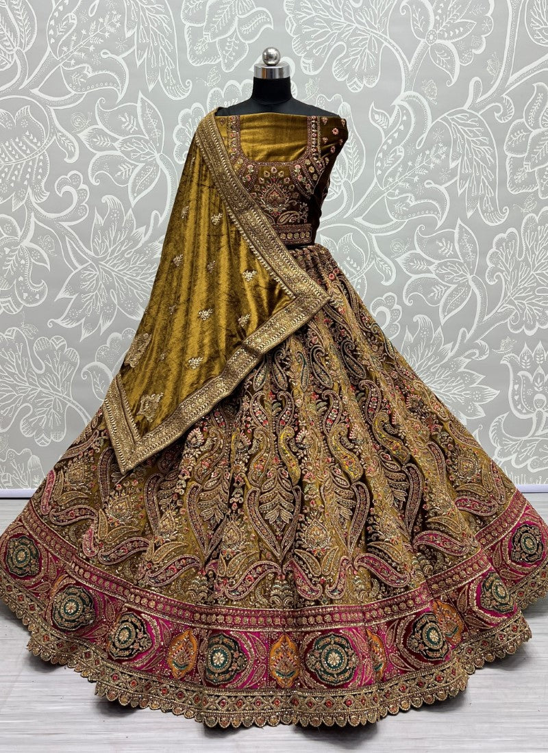 Fabulously Crafted Pastel Velvet Designed Fancy Embroidered Bridal Golden Lehengacholi with Double Dupatta