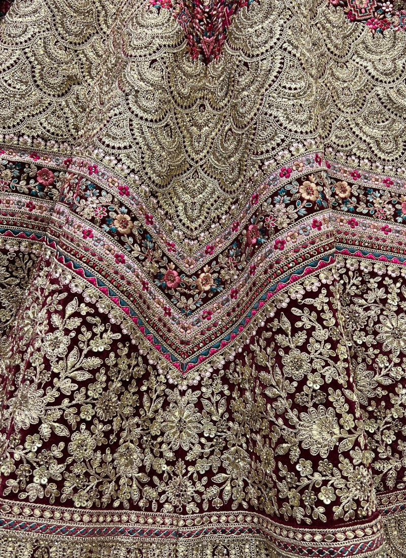 Neatly crafted Thread embroidery with Dori work bridal Maroon Lehengacholi