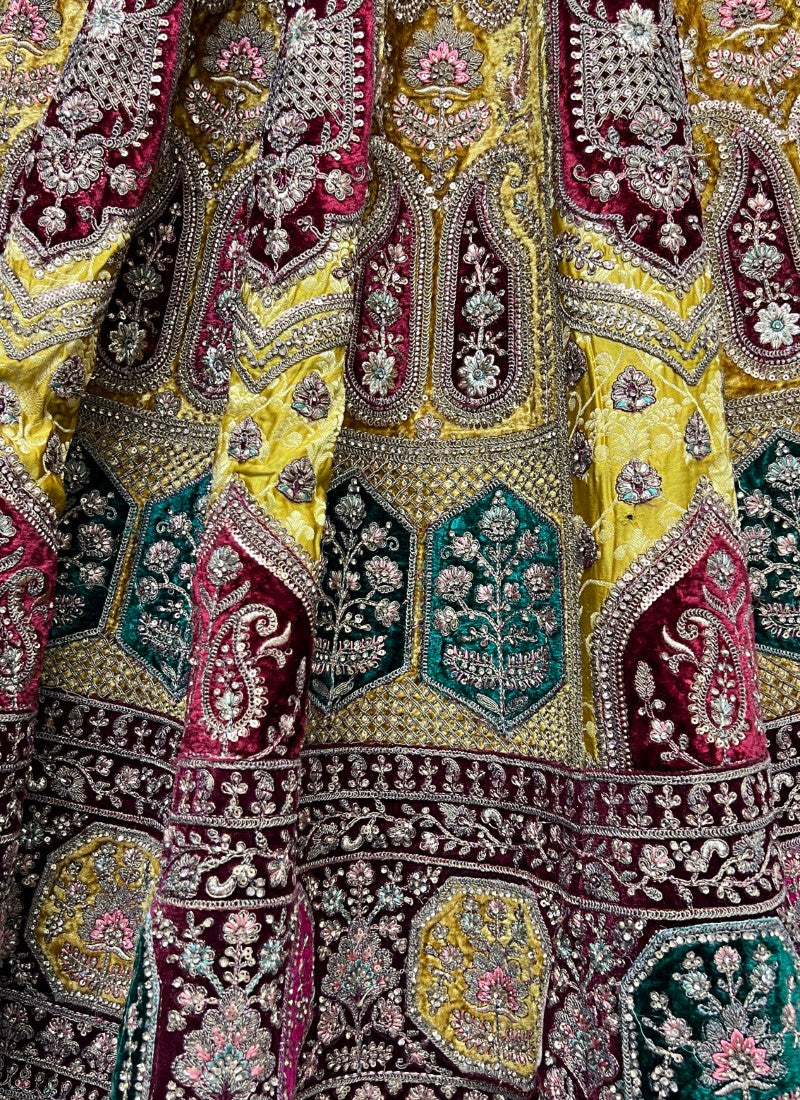 Splendid Banarasi Silk crafted In various color velvet patch work Perfect Reception Lehengacholi