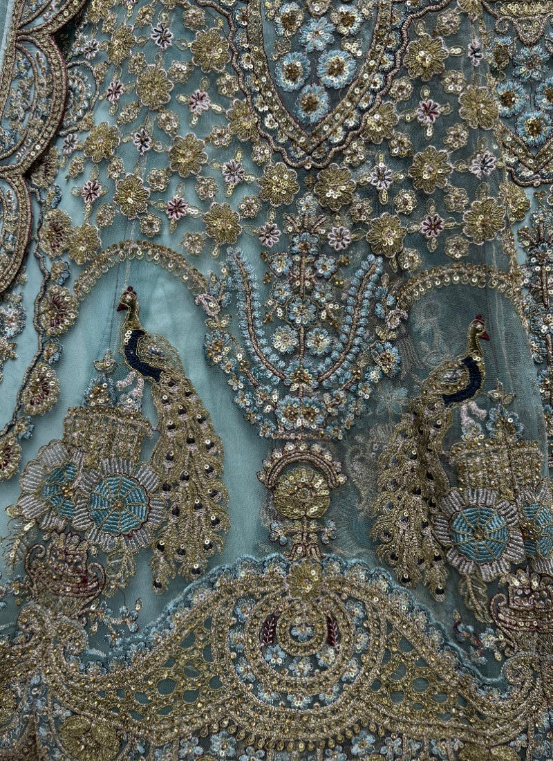 Handwork Look Inspired Embroidered Net Partywear Lehengacholi in Firozi Colour