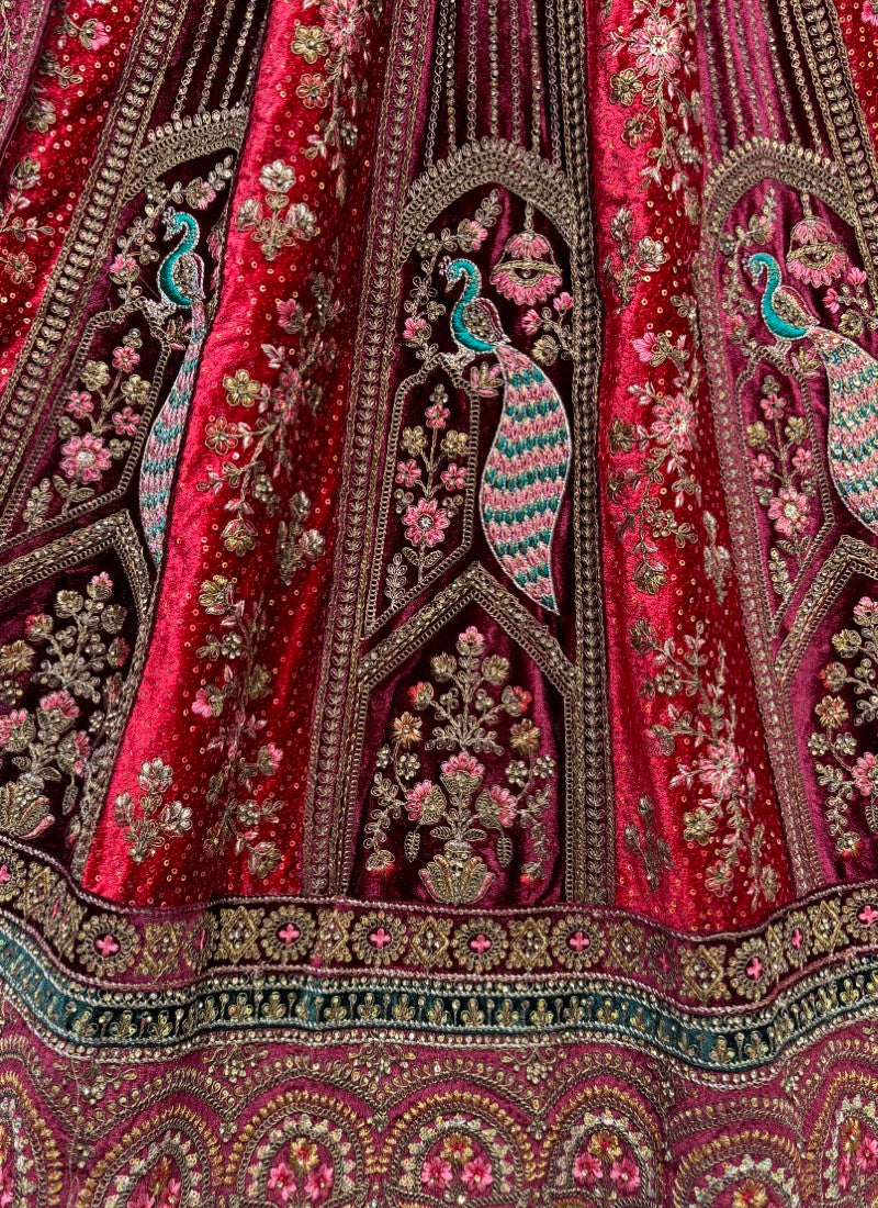 Peacock and flower pattern embroidered Velvet Lehengacholi in Maroon Colour