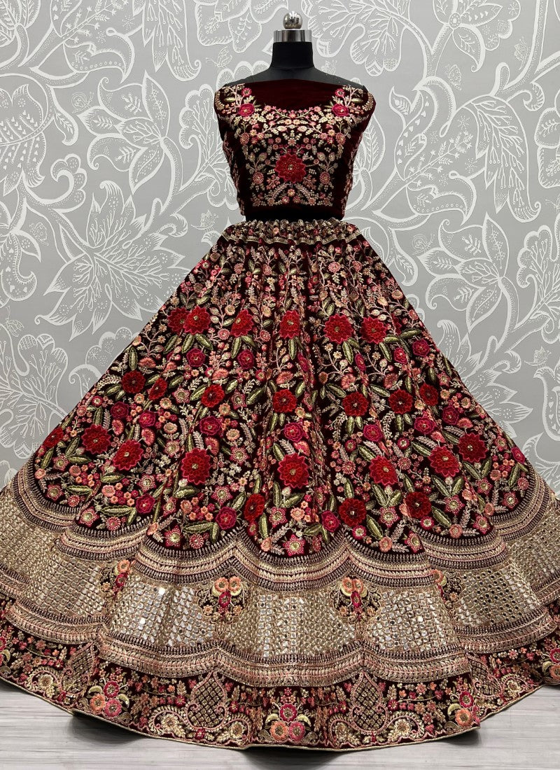 Admirable Art of Work in Maroon Bridal Lehenga - Patch work with handcrafted mirror and many more.