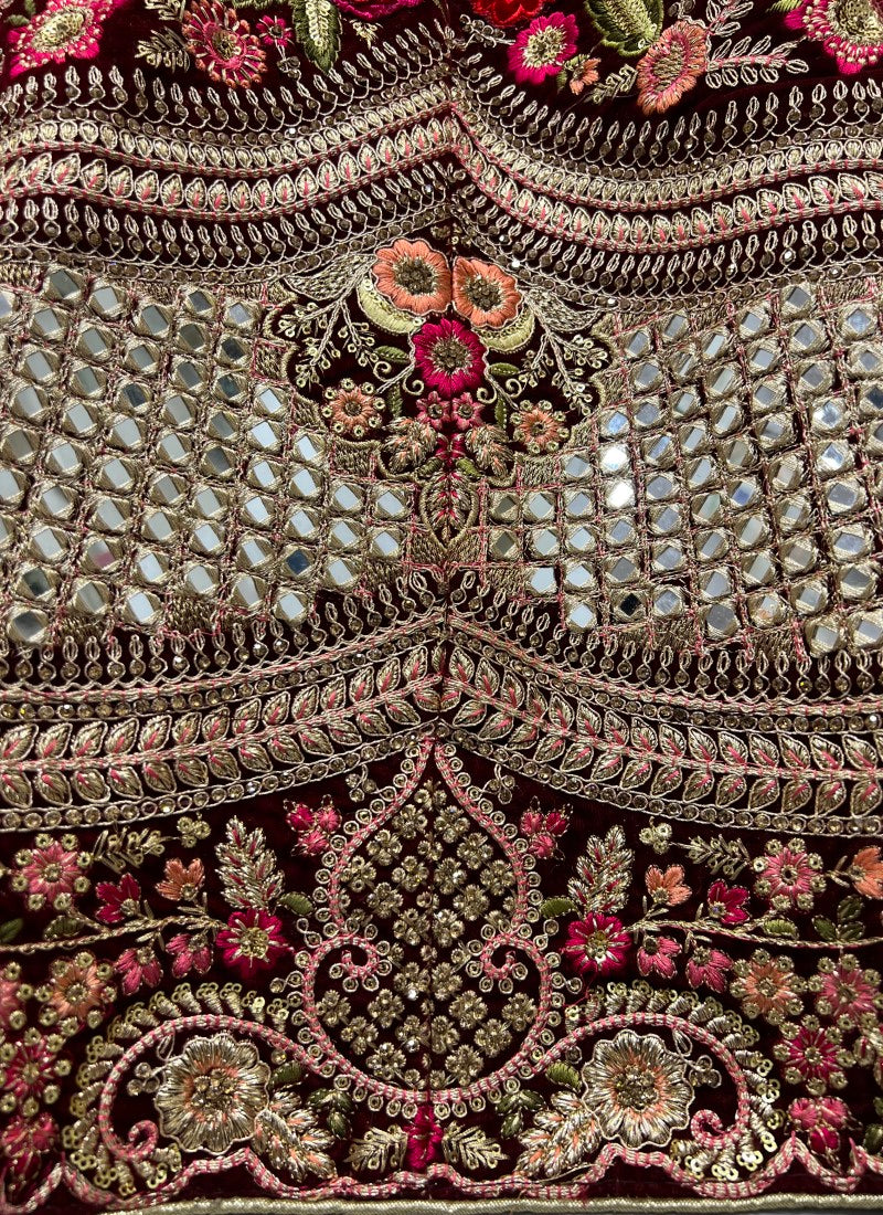Admirable Art of Work in Maroon Bridal Lehenga - Patch work with handcrafted mirror and many more.