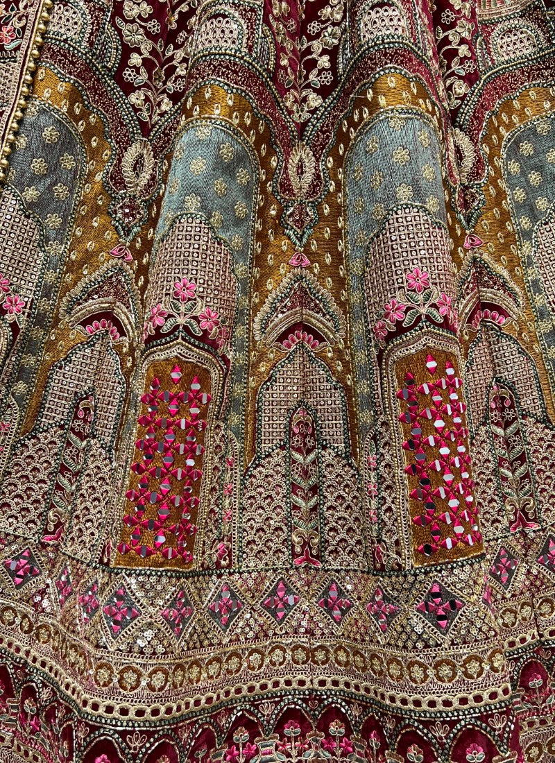 Heavy handwork and hand Mirror crafted designer bridal Maroon Lehengacholi
