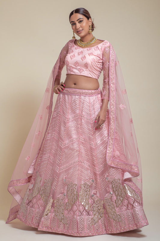 Pinkish Lehengacholi in designer work with foil embedded peacock
