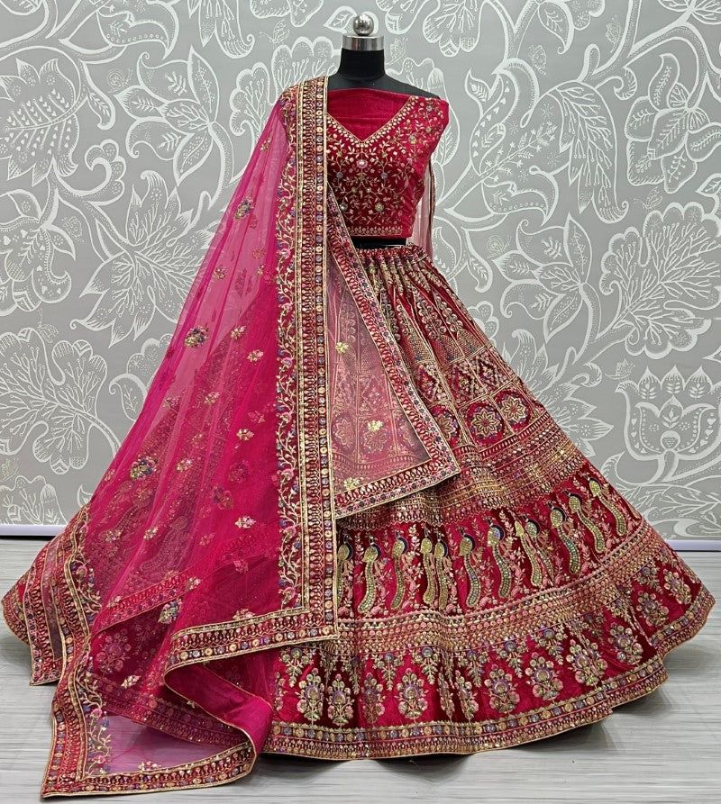 Fabulous embroidery peacock and flower pattern on velvet bridal Lehengacholi Pink