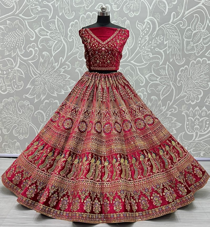 Fabulous embroidery peacock and flower pattern on velvet bridal Lehengacholi Pink