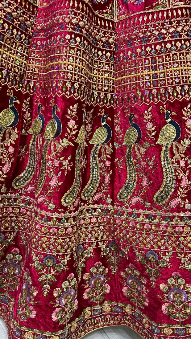 Fabulous embroidery peacock and flower pattern on velvet bridal Lehengacholi Pink