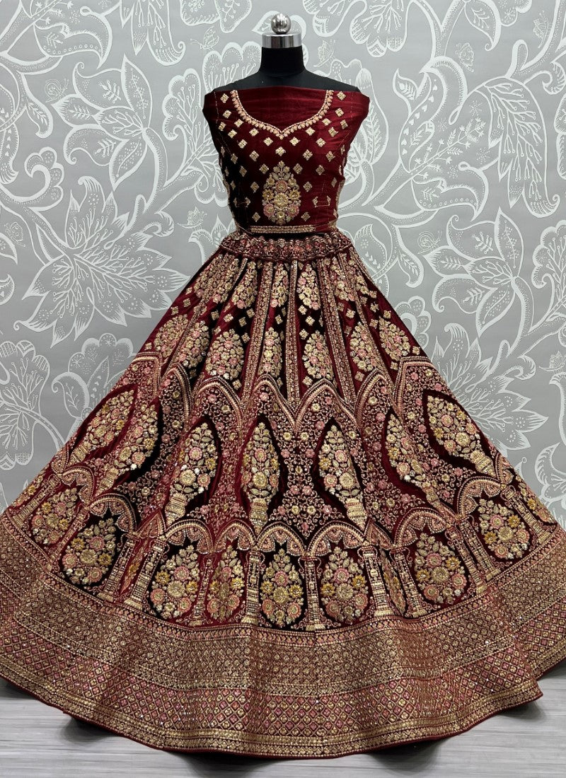 Exceptional craftsmanship on velvet embedded with different kind of embroidery bridal Maroon Lehengacholi