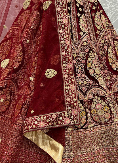 Exceptional craftsmanship on velvet embedded with different kind of embroidery bridal Maroon Lehengacholi