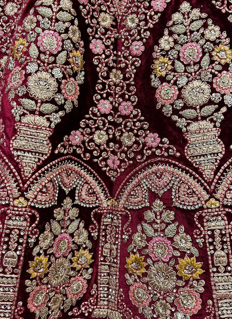 Exceptional craftsmanship on velvet embedded with different kind of embroidery bridal Maroon Lehengacholi