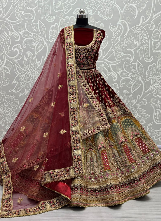 Heavy handwork and hand Mirror crafted designer bridal Maroon Lehengacholi