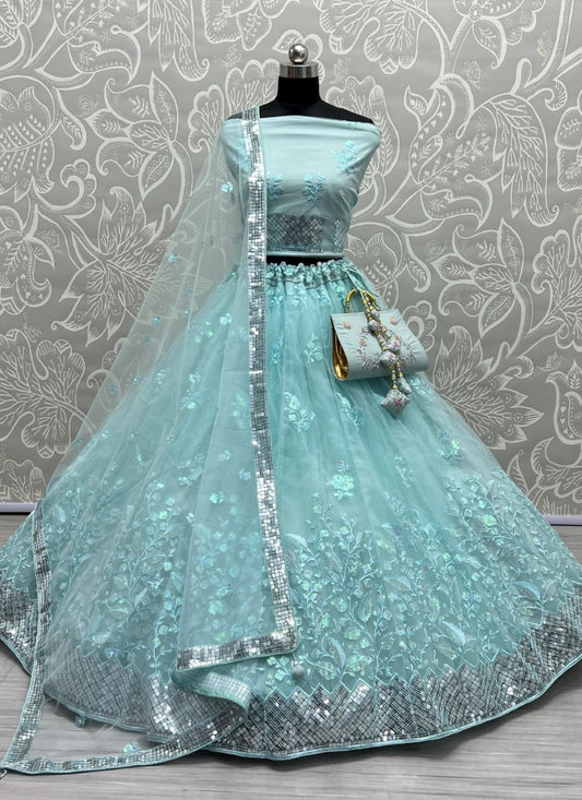 Rainbow Sequins and designer leaf embroidered Sea Blue Lehengacholi with matching purse and Latkan