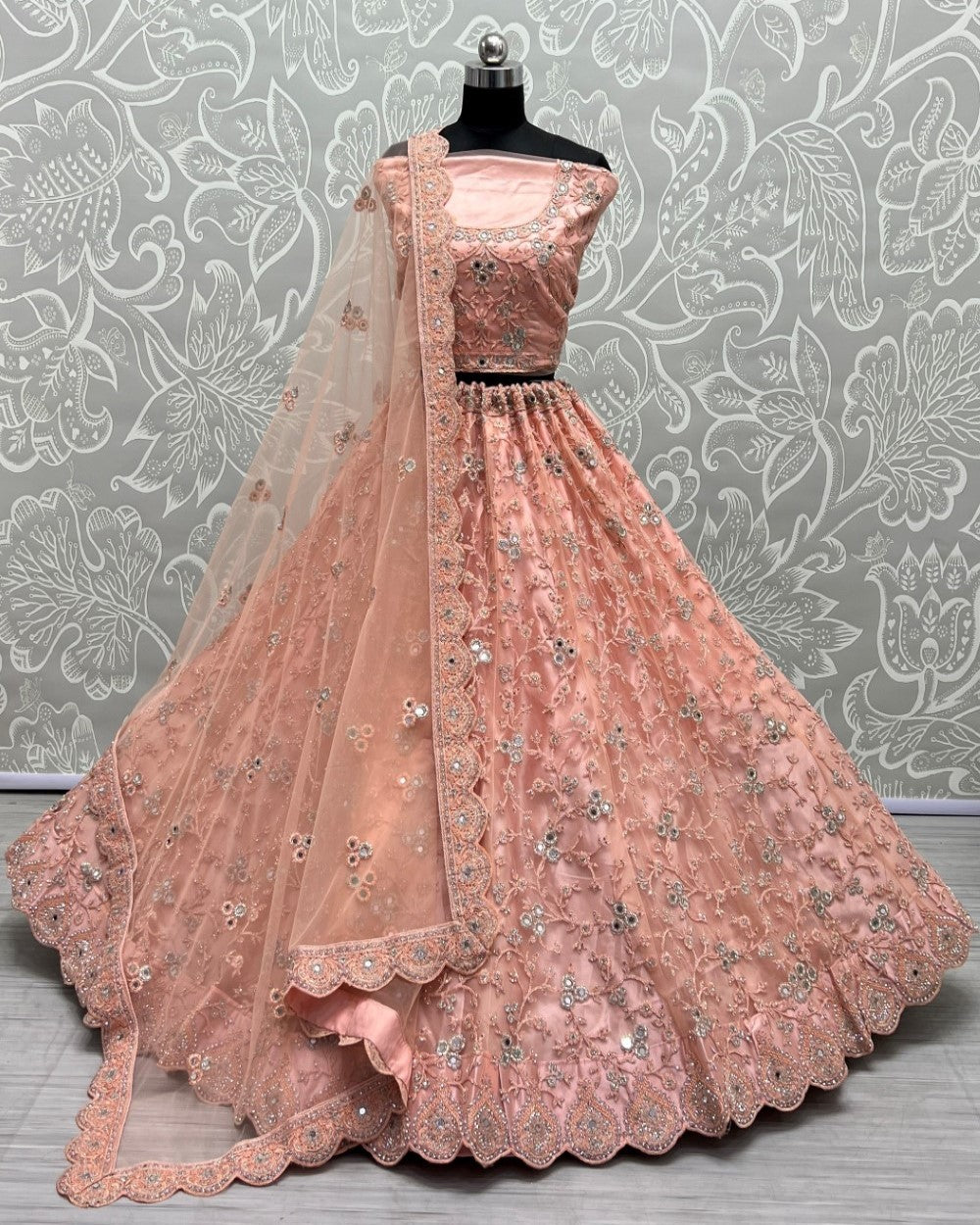 Designer detailed embroidered work on Peach Wedding Lehengacholi