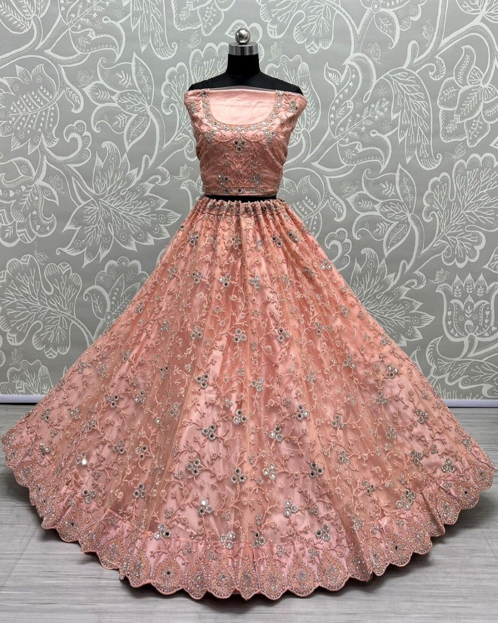 Designer detailed embroidered work on Peach Wedding Lehengacholi