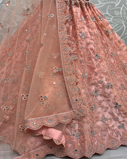 Designer detailed embroidered work on Peach Wedding Lehengacholi