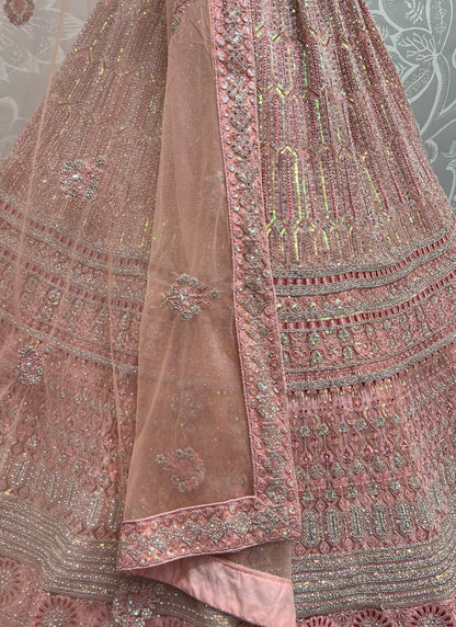 Rainbow sequins and fancy embroidery designer partywear Peach Lehengacholi