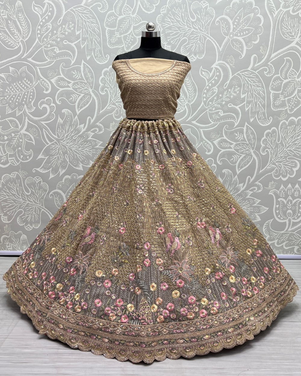 Fancy Embroidery of sequins and Zari Net Chickoo Lehengacholi