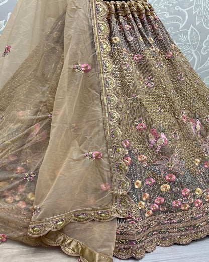 Fancy Embroidery of sequins and Zari Net Chickoo Lehengacholi