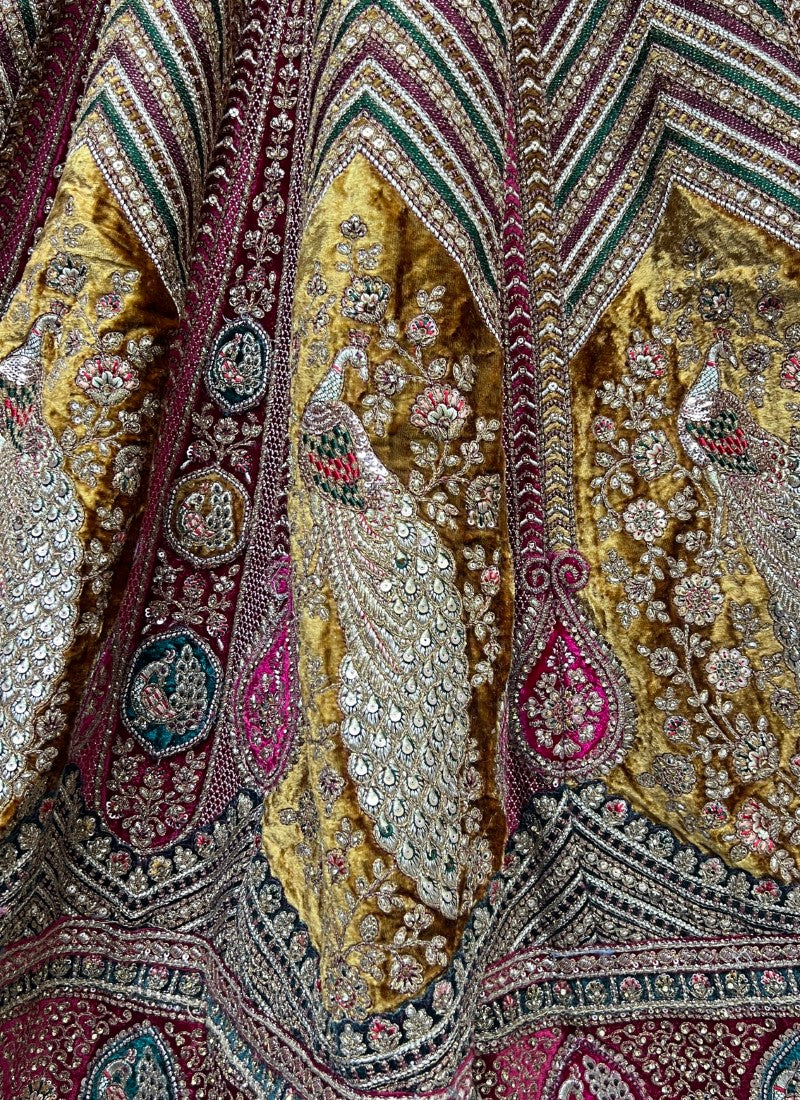 Fabulously Peacock Pattern work on Velvet Designer Lehengacholi with Beautiful blouse Mustard