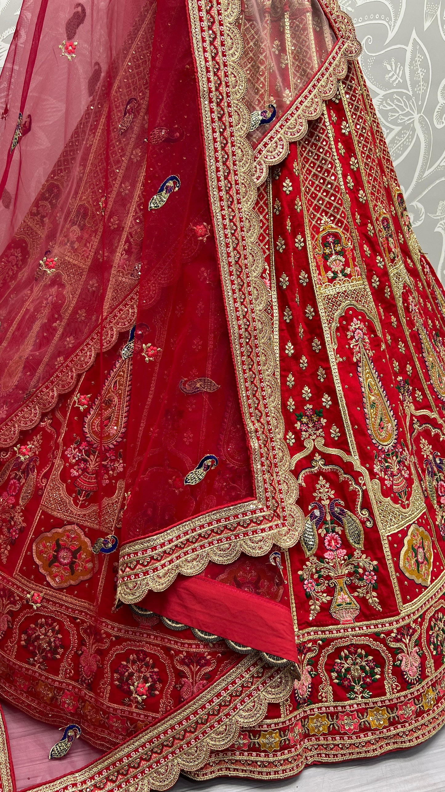 Charismatic Hand khatali work with Zardosi and differnt embroidery crafted bridal Red Lehengacholi