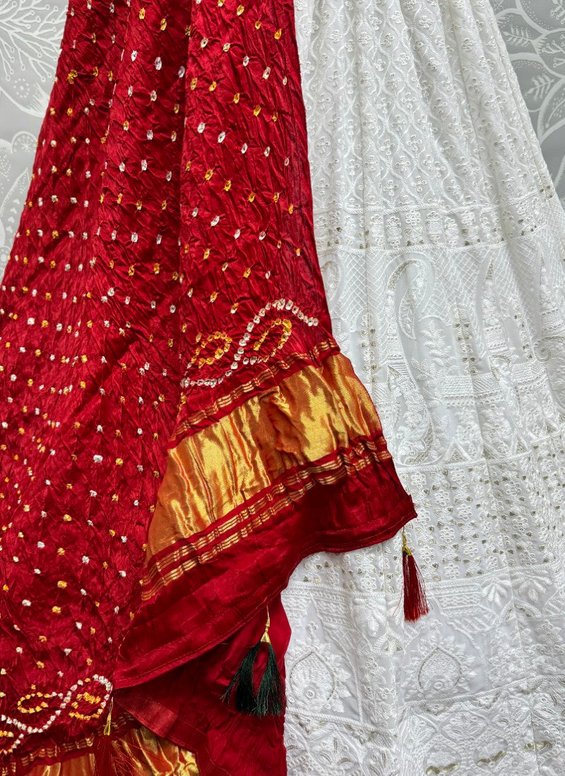 Georgette fabric cotton thread work Lehengacholi in White with pure Bandhani dupatta