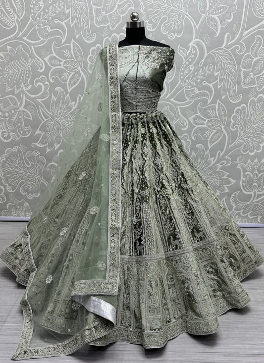 Urging fancy embroidery work leather color range partywear Lehengacholi \in Pista