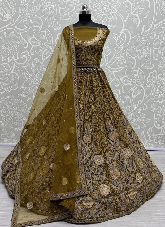 Exclusive Color Range in Partywear Mettalic Gold Colour Lehengacholi crafted with various work