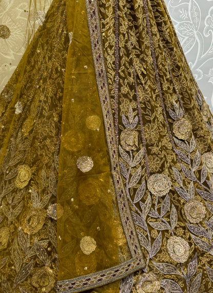 Exclusive Color Range in Partywear Mettalic Gold Colour Lehengacholi crafted with various work