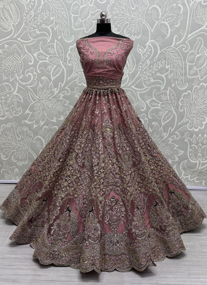 Handwork Look Inspired Embroidered Net Partywear Lehengacholi in Purple Colour