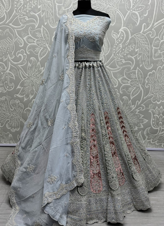 Tremendous art of work with velvet patch work on Georgette Lehengacholi in Grey Colour