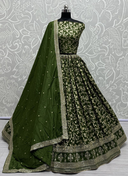 Perfect detailed embroidery work designer partywear Lehengacholi in green colour