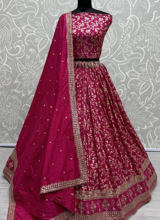 Perfect detailed embroidery work designer partywear Lehengacholi in rani colour