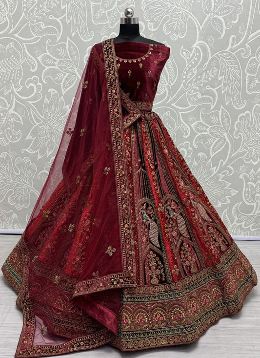 Peacock and flower pattern embroidered Velvet Lehengacholi in Maroon Colour