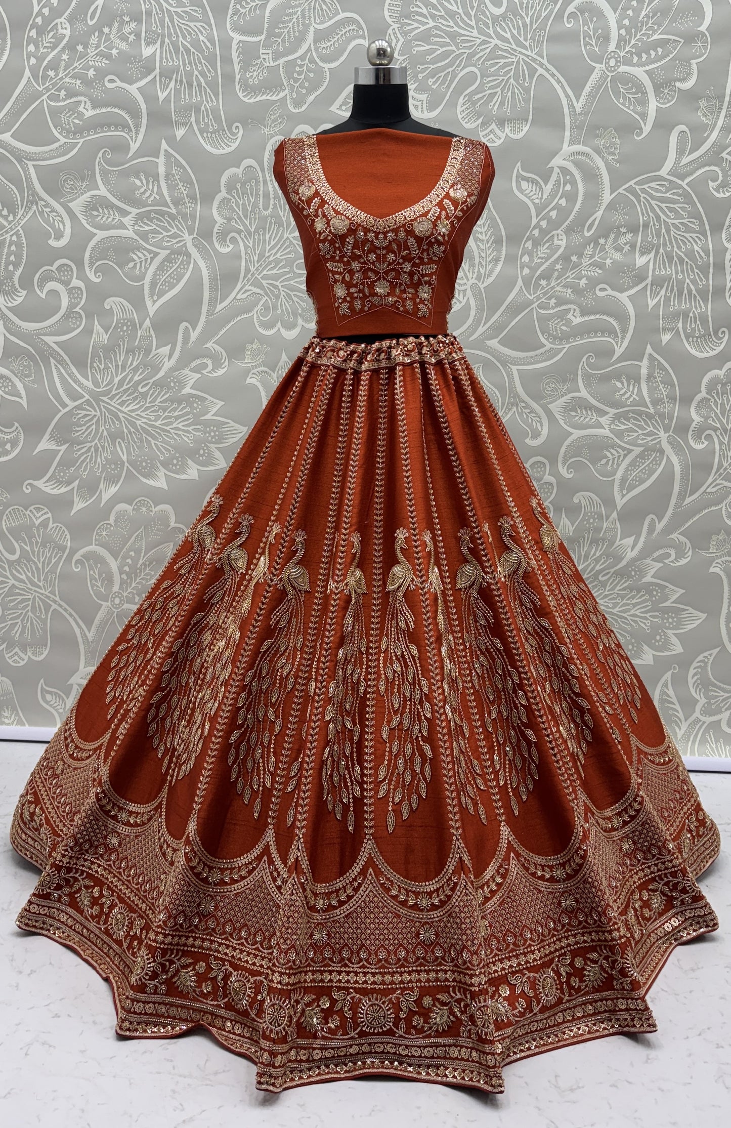 Rust Orange Silk Bridal Lehenga Choli with Peacock Embroidery & Designer Net Dupatta