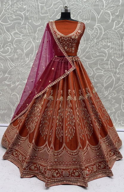 Rust Orange Silk Bridal Lehenga Choli with Peacock Embroidery & Designer Net Dupatta