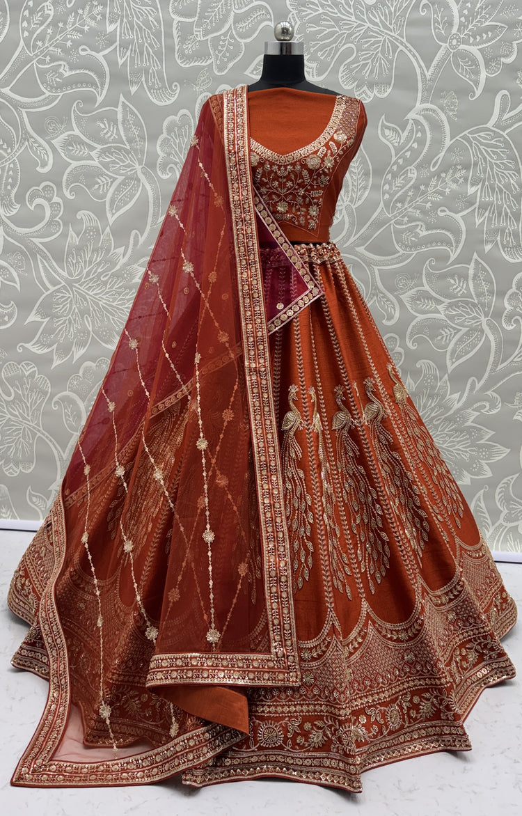 Rust Orange Silk Bridal Lehenga Choli with Peacock Embroidery & Designer Net Dupatta