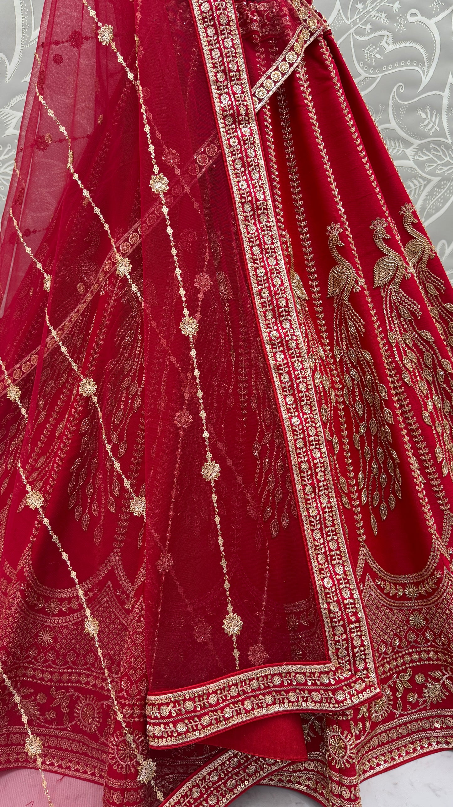 Ruby Red Silk Bridal Lehenga Choli with Peacock Embroidery & Designer Net Dupatta