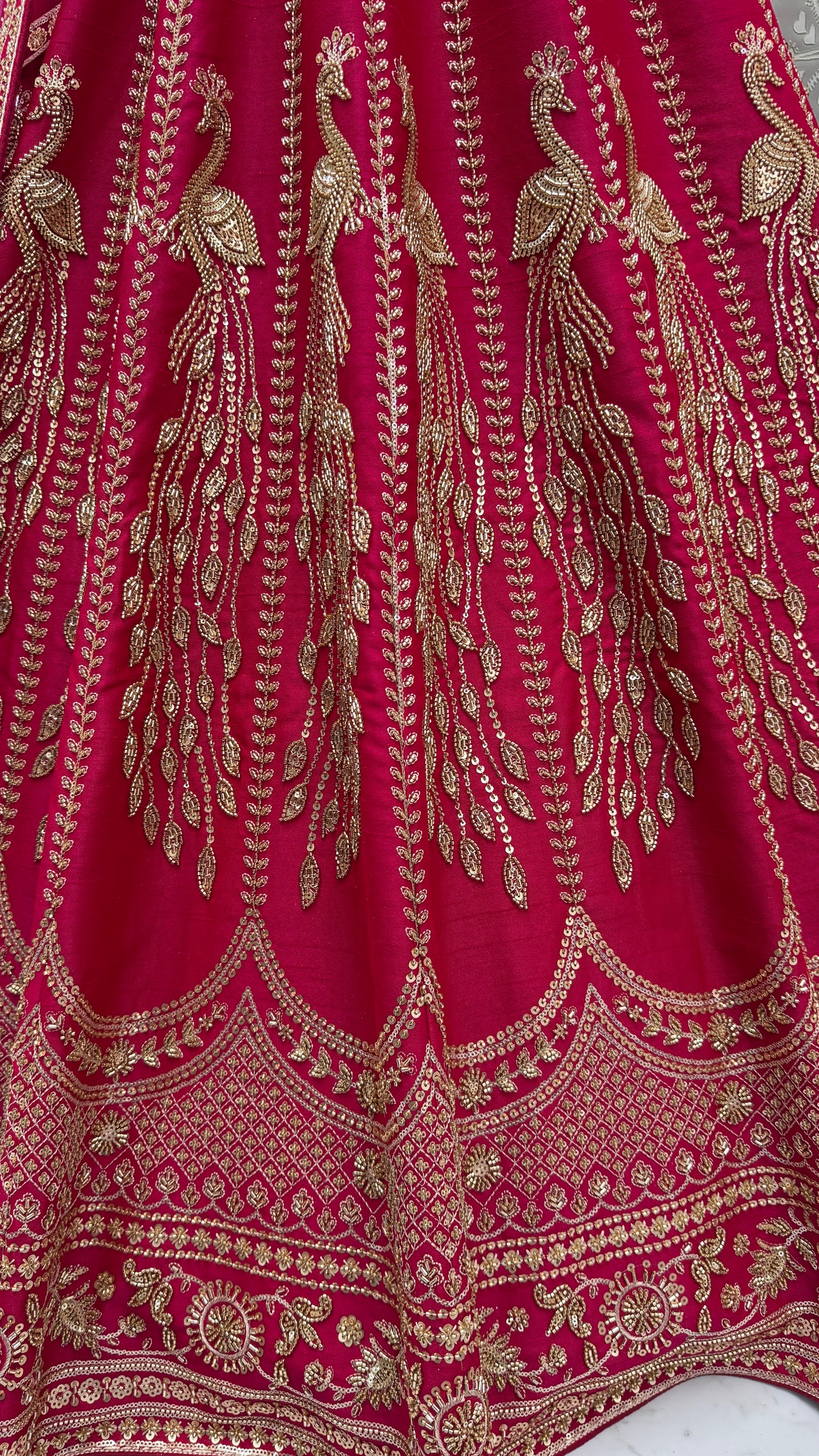 Rani Pink Silk Bridal Lehenga Choli with Peacock Embroidery & Designer Net Dupatta