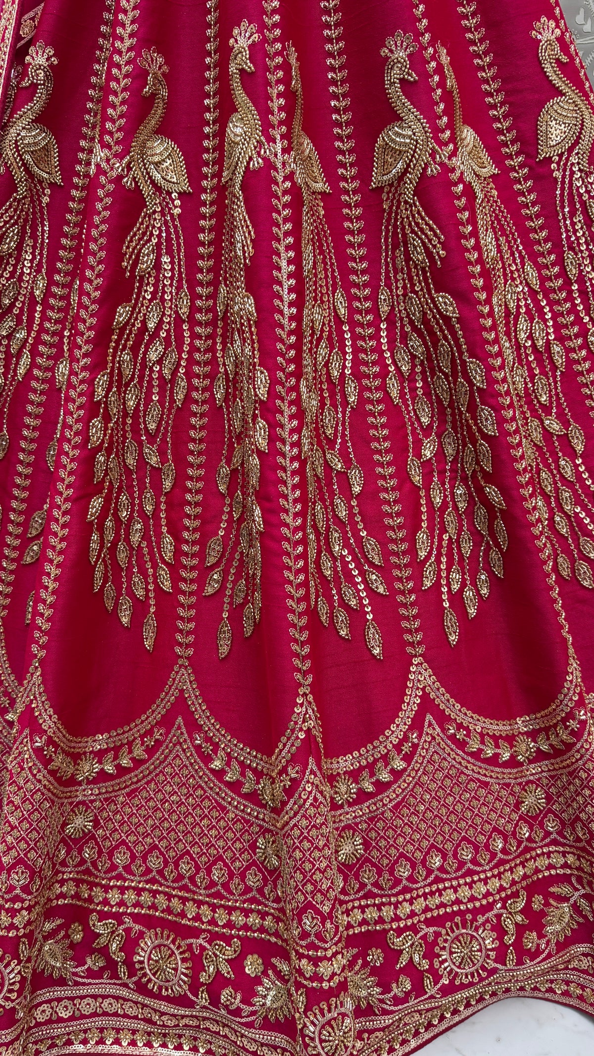 Rani Pink Silk Bridal Lehenga Choli with Peacock Embroidery & Designer Net Dupatta