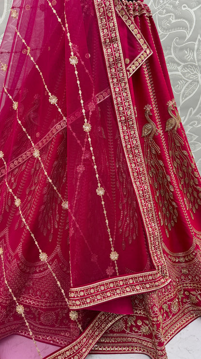 Rani Pink Silk Bridal Lehenga Choli with Peacock Embroidery & Designer Net Dupatta