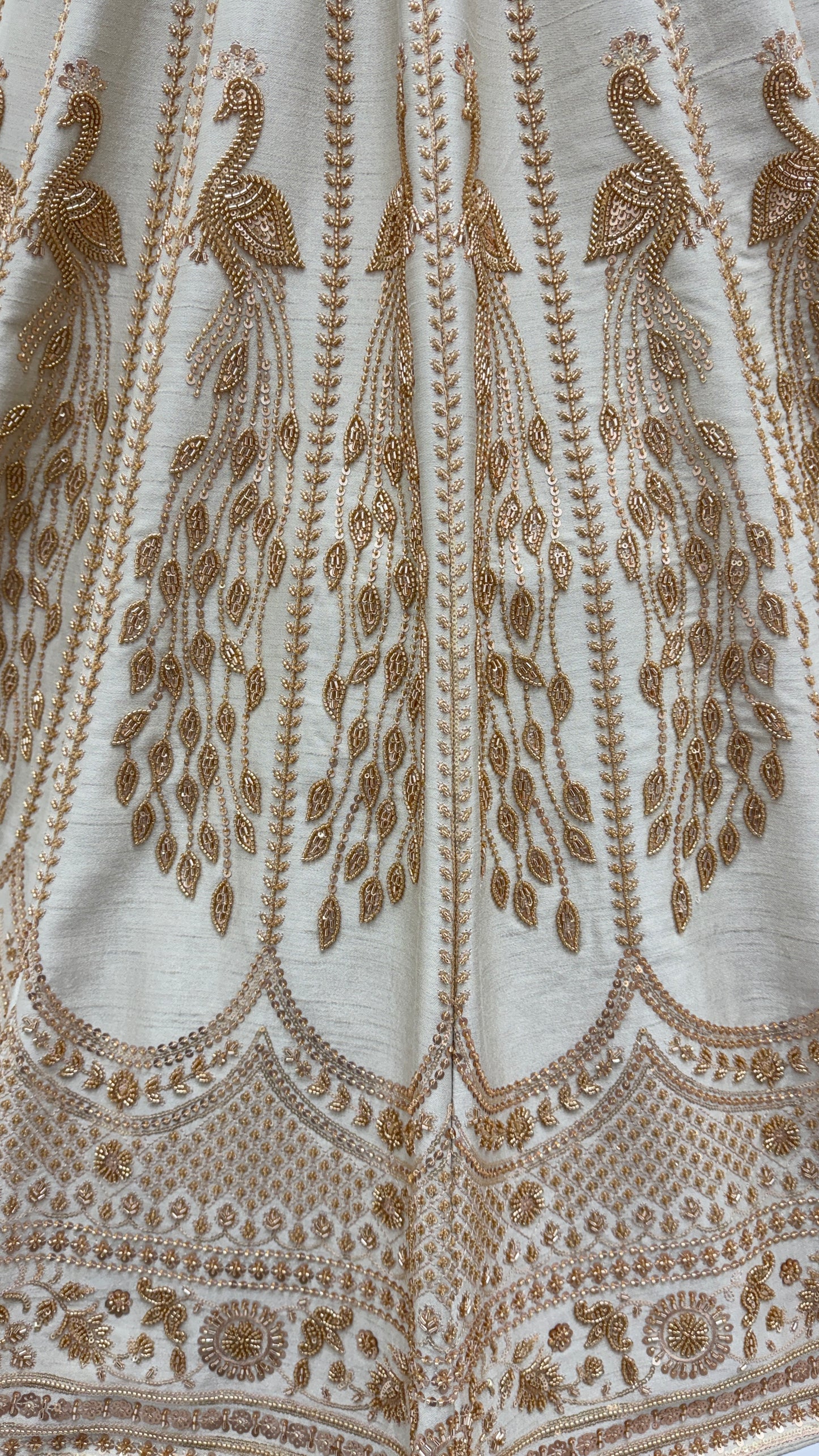 Ivory Silk Bridal Lehenga Choli with Peacock Handwork & Designer Net Dupatta