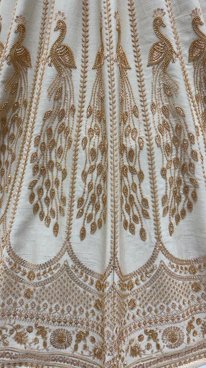 Ivory Silk Bridal Lehenga Choli with Peacock Handwork & Designer Net Dupatta