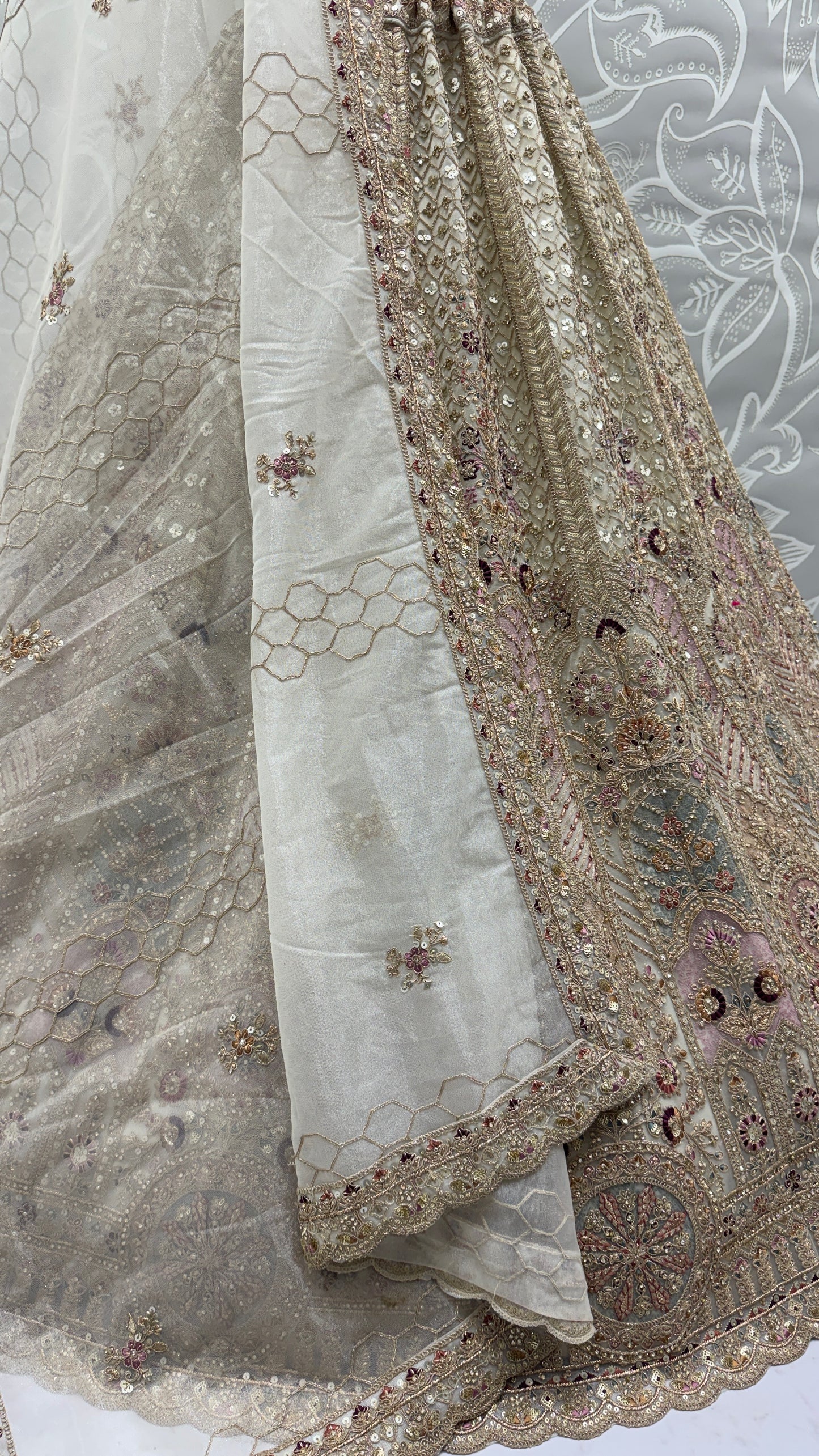 Ivory Bridal Net Lehenga Choli with Fancy Chapat Zari, Multi Thread Embroidery & Zircon Diamond Work