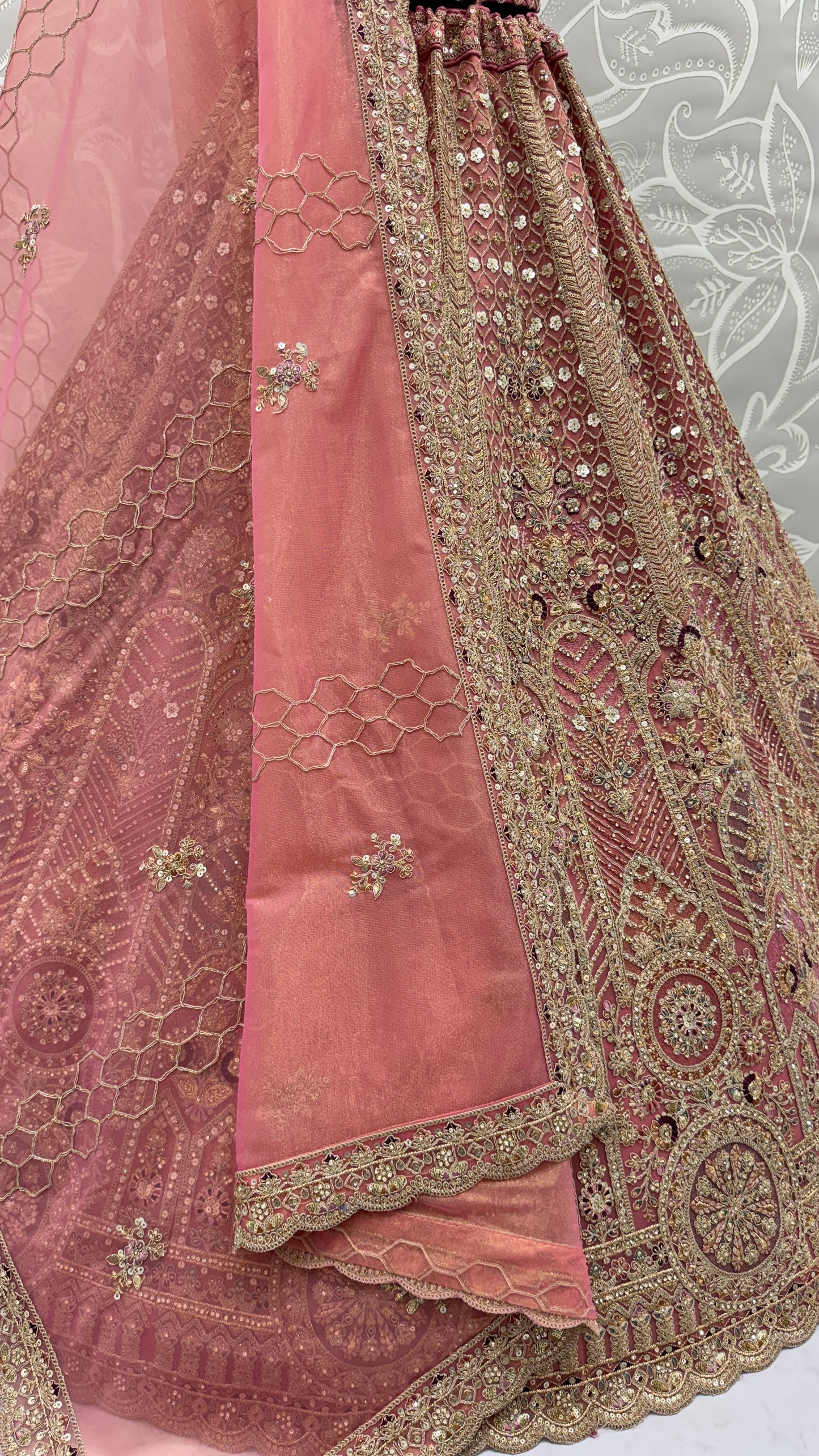 Dusty Rose Bridal Net Lehenga Choli with Fancy Chapat Zari, Multi Thread Embroidery & Zircon Diamond Work